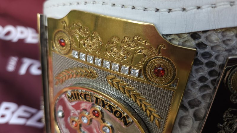 MVP-Paul-vs-Tyson Ornate gold championship belt with red gemstones